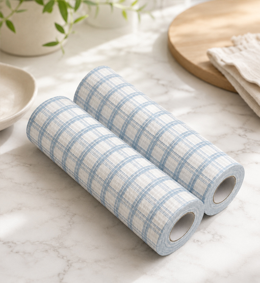 Kitchen paper towels beside a commercial food preparation counter