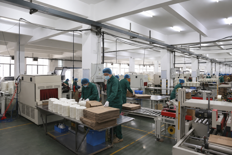Export cartons of disposable foodservice packaging prepared for container shipment